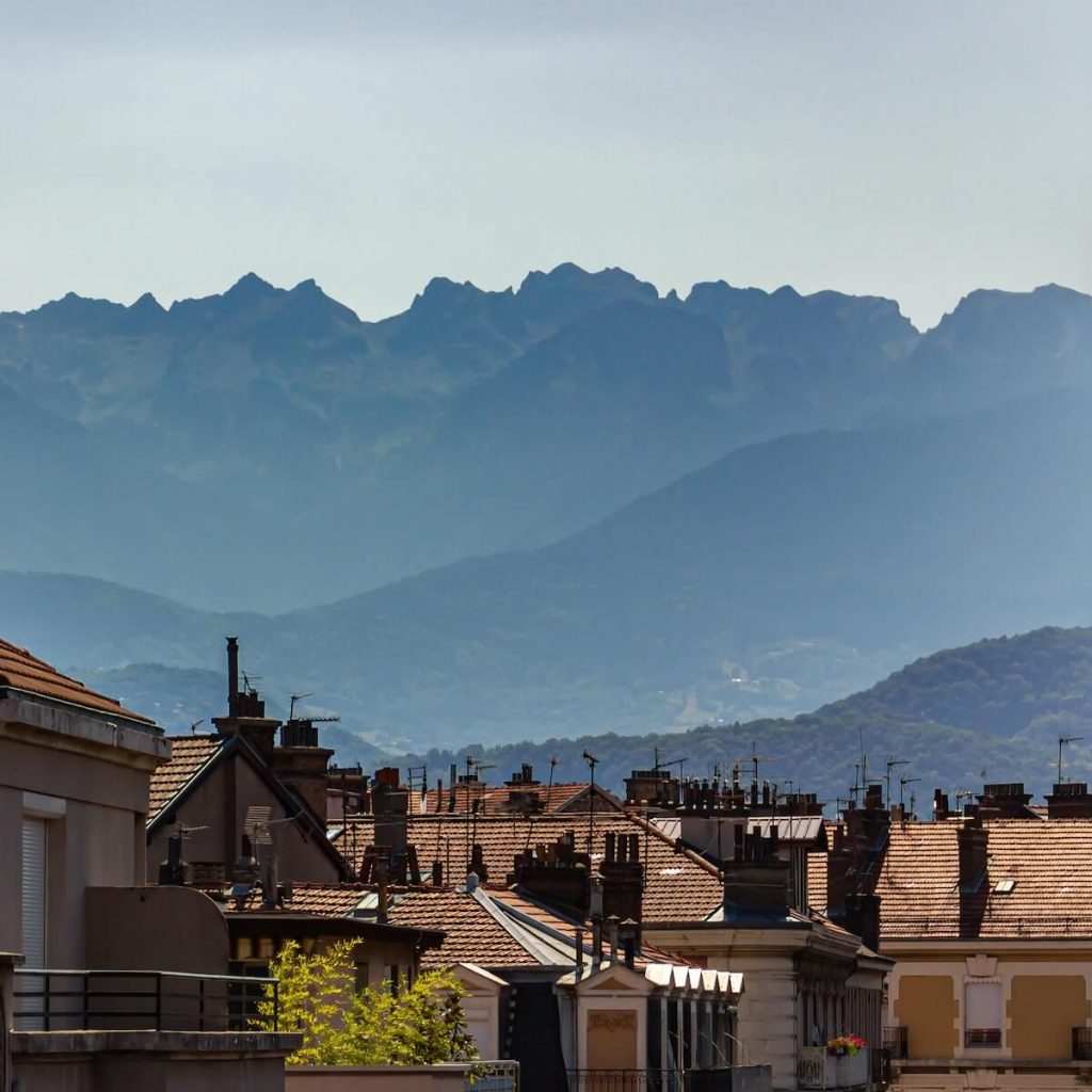 Grenoble city with mountains in the background