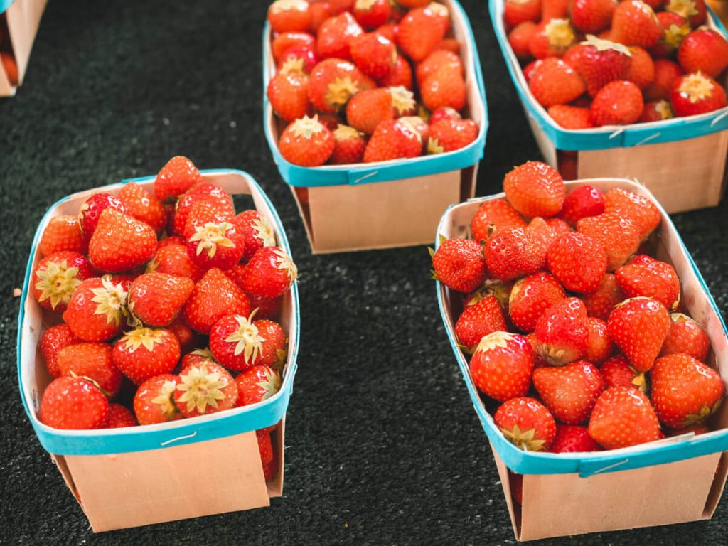 Strawberries in wooden carton