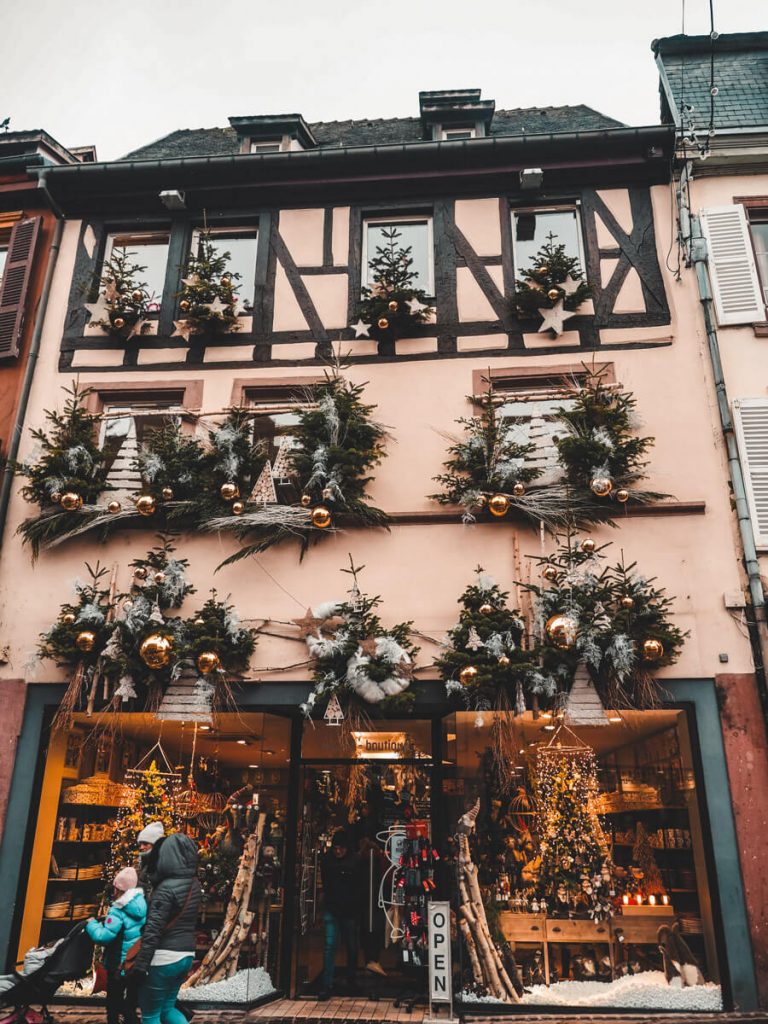 Gorgeous buildings covered in decorations in Colmar