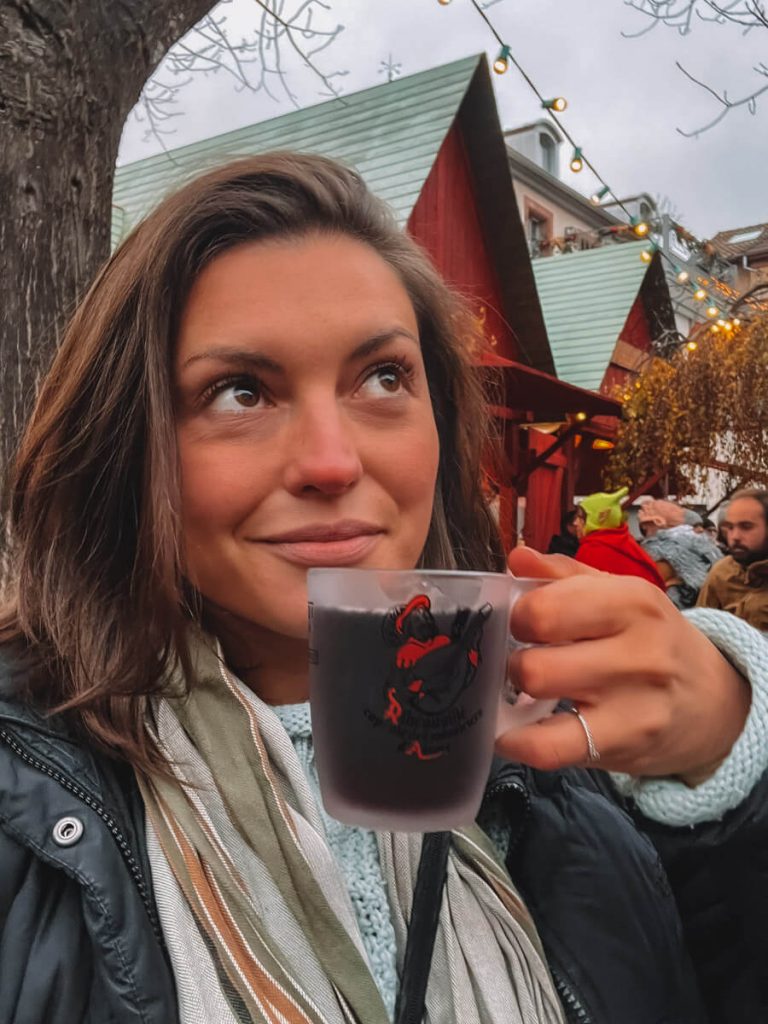 Kat drinking a mulled wine at the Ribeauville Christmas Market