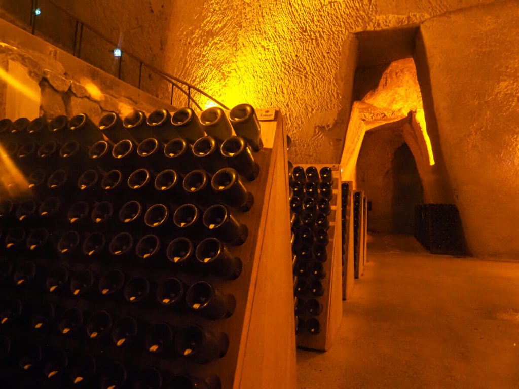 Champagne Bottles aging in the Ruinart cellars