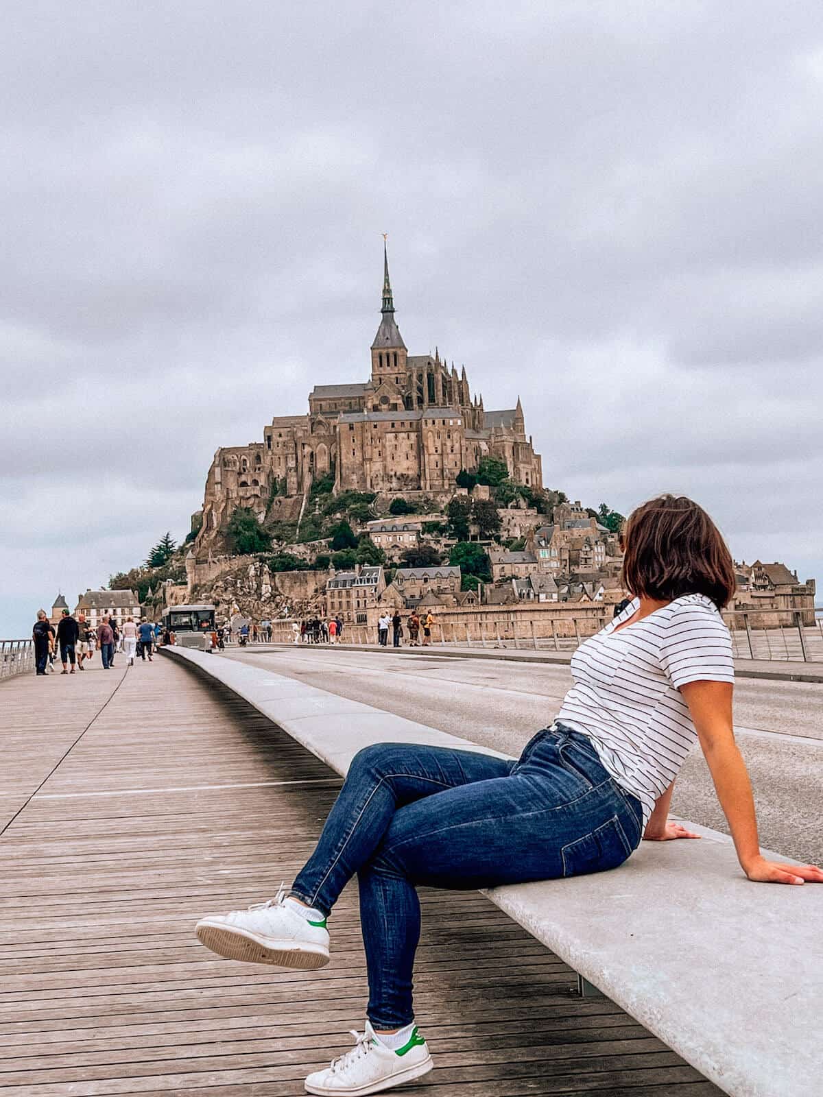 How to Get to Mont St Michel - Kat sitting on way to Mont St Michel