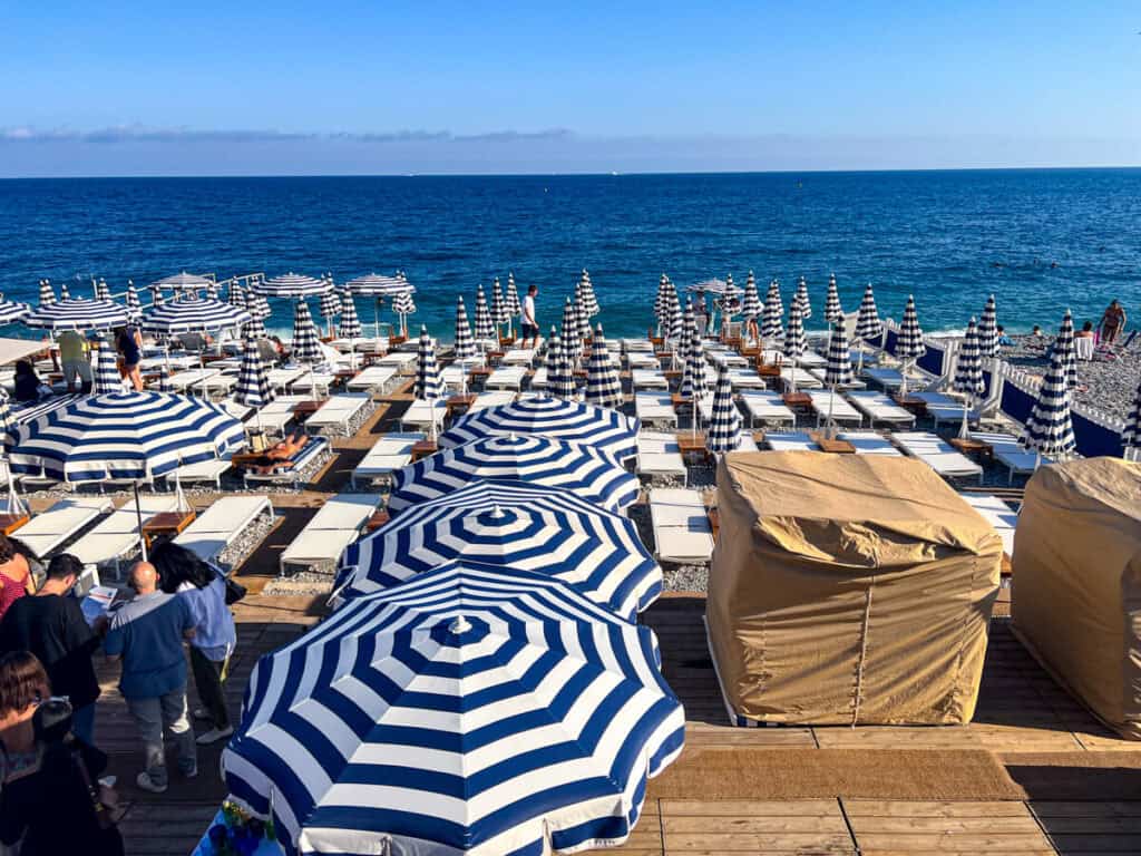 Blue and white beach umbrellas in Nice