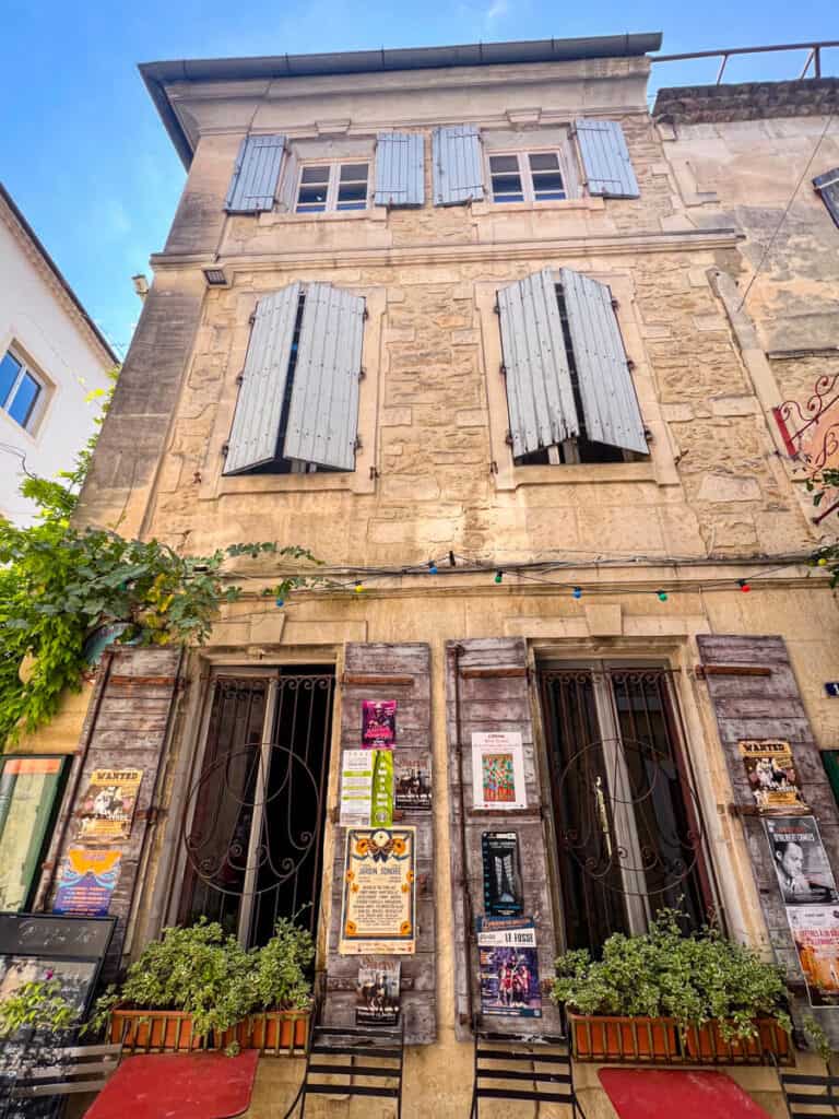 Stone house with light blue shutters in Provence