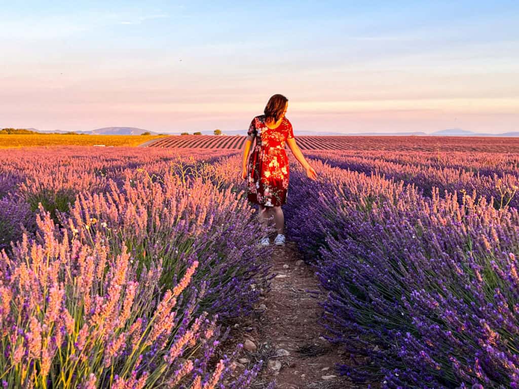 Sunrise with Kat walking through a lavender field in Valensole