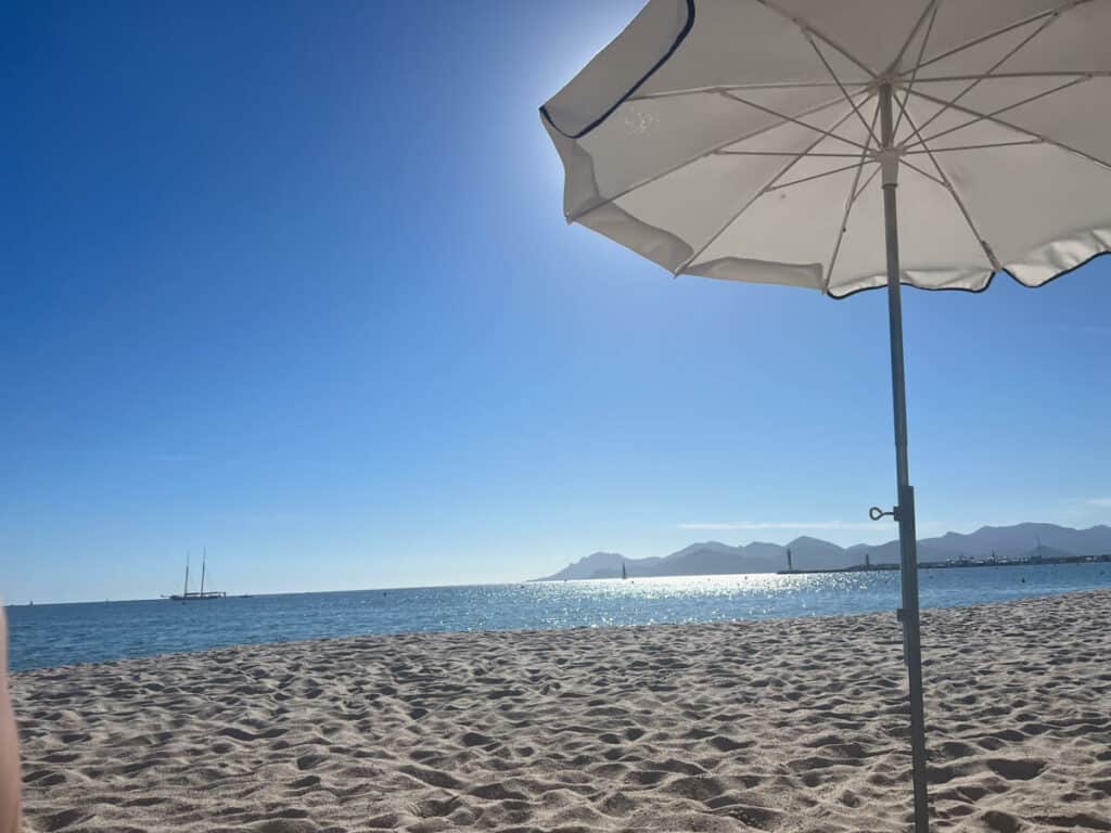 Beach umbrella on the beach in Cannes