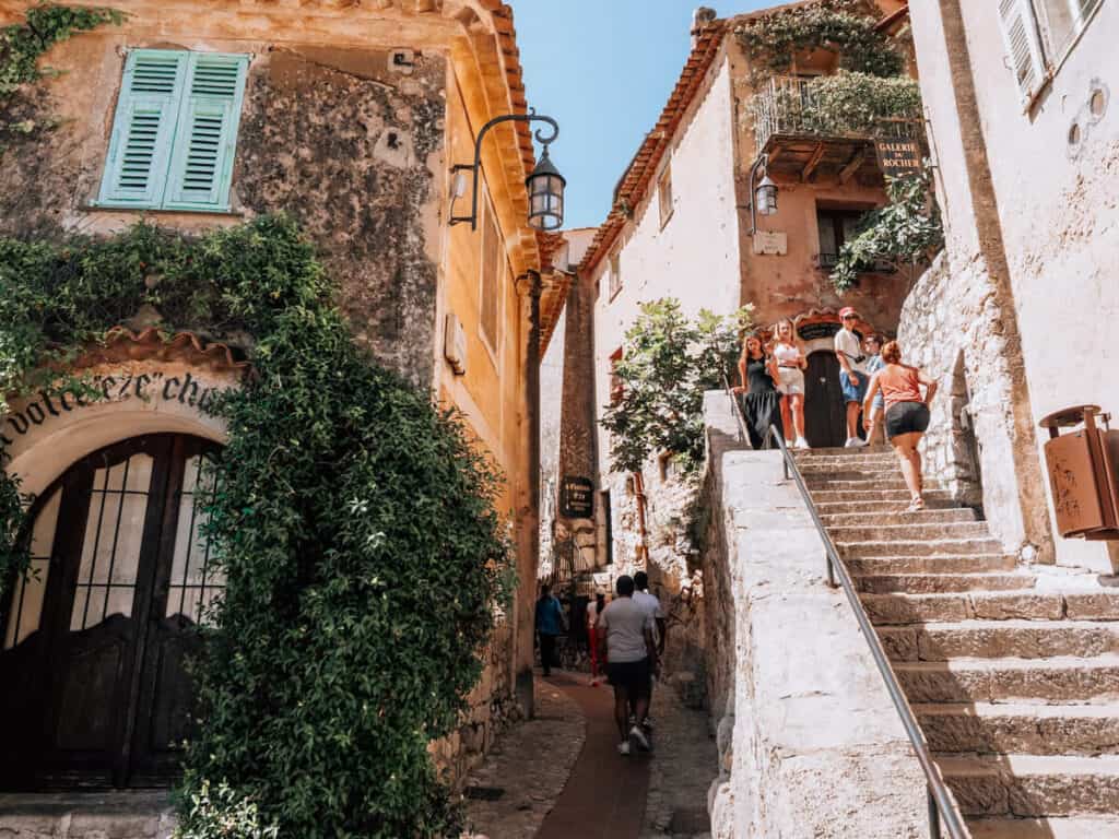 Eze old town with greenery covered building