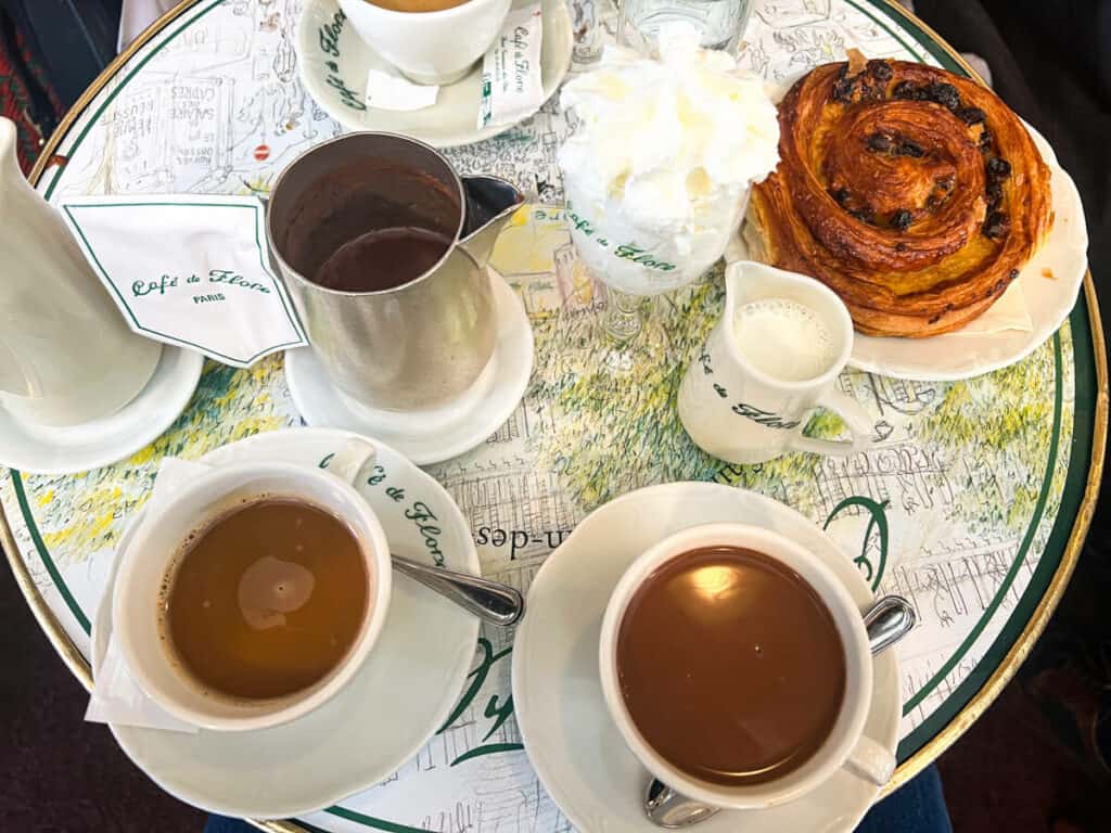 Breakfast with coffee and hot chocolate and pastry at Cafe de Flore