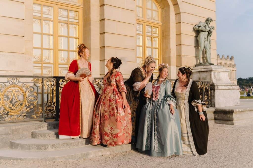 Chatting in our costumes at Versailles