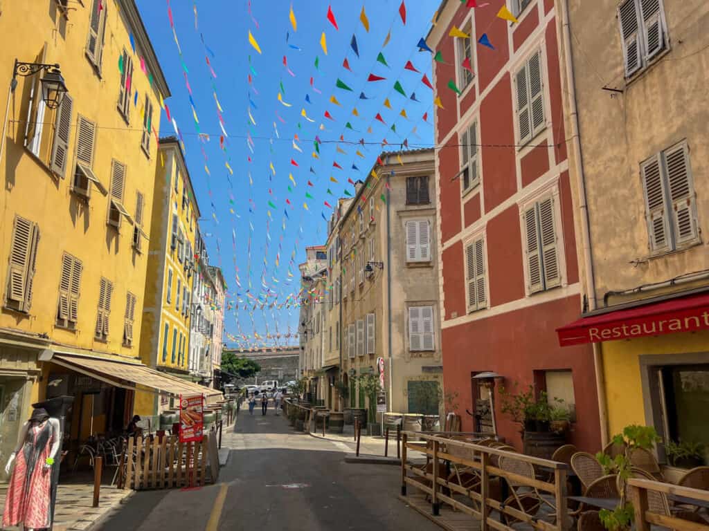Colorful flag covered street in Ajaccio
