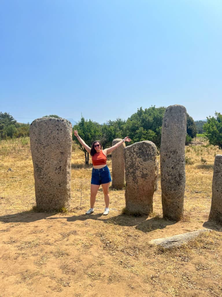 Kat posing at the megalithic site at Cauria