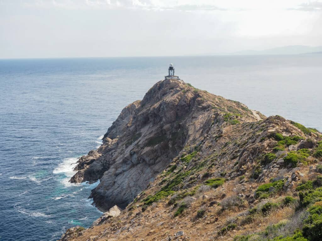 Lighthouse and sea on the Pointe de la Revellata hike
