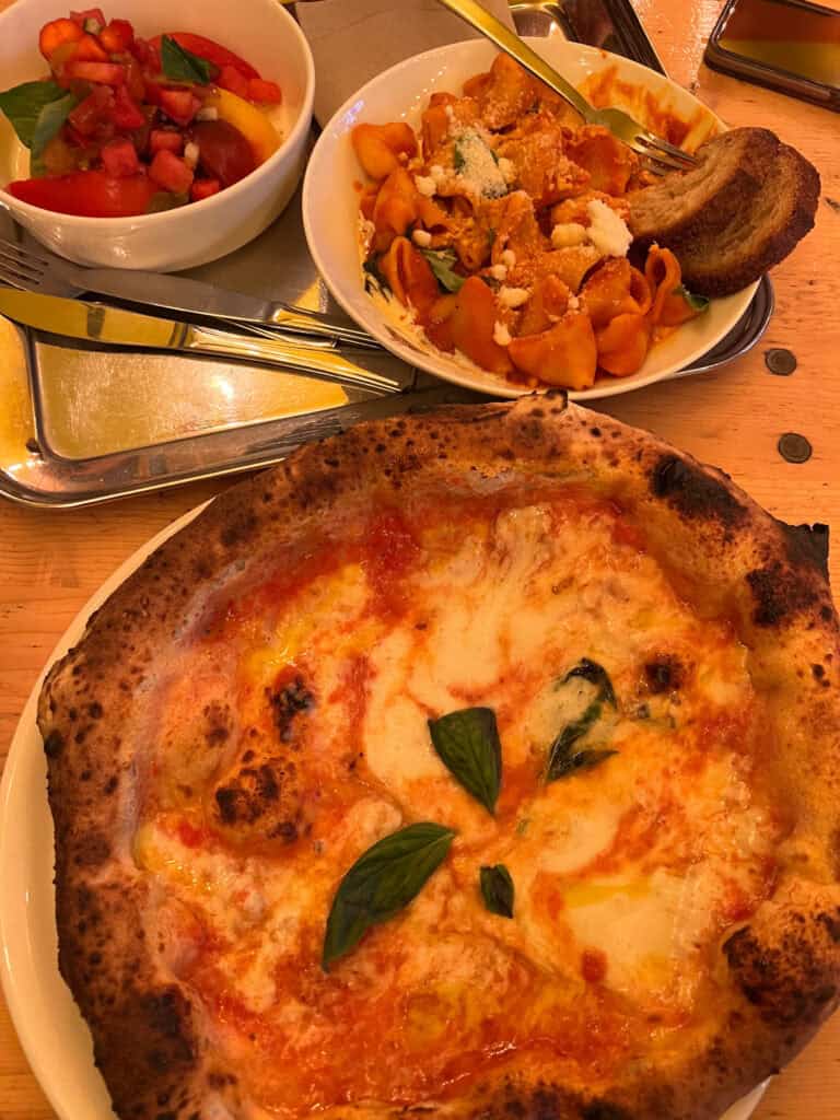 PIzza, pasta, and tomato salad at La Felicita