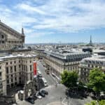 View of Paris including Eiffel Tower in the distance and Palais Garnier closer from Galeries Lafayette