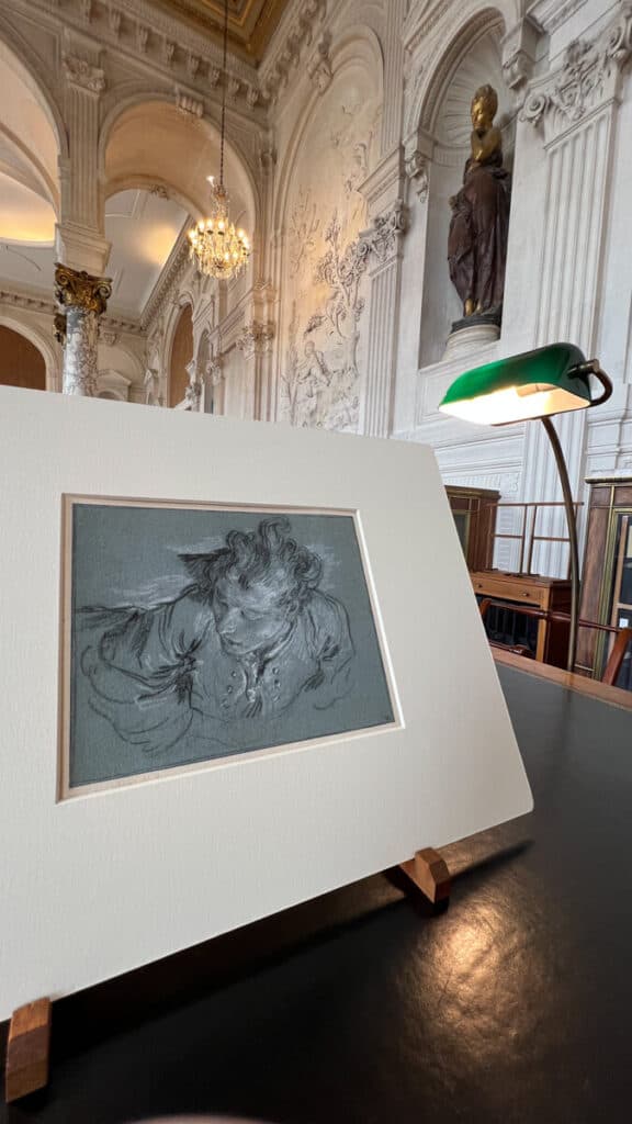 Art displayed on an easel in the Consultation Room at the Louvre