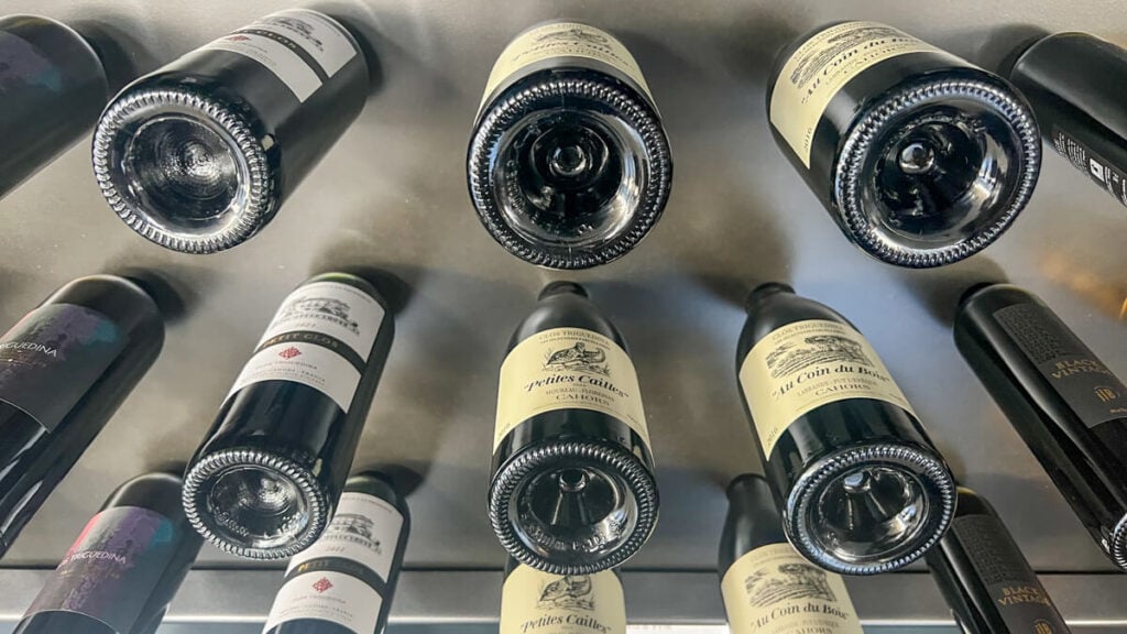 Clos Triguedina wine bottles on display