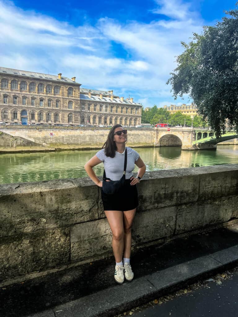 Kat by the Seine in shorts and a striped top