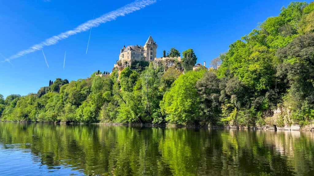 Kayaking on the Dordogne with castle view